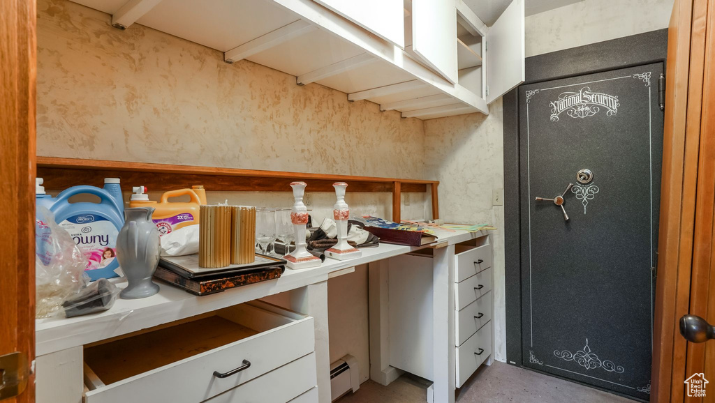 Spacious closet with baseboard heating