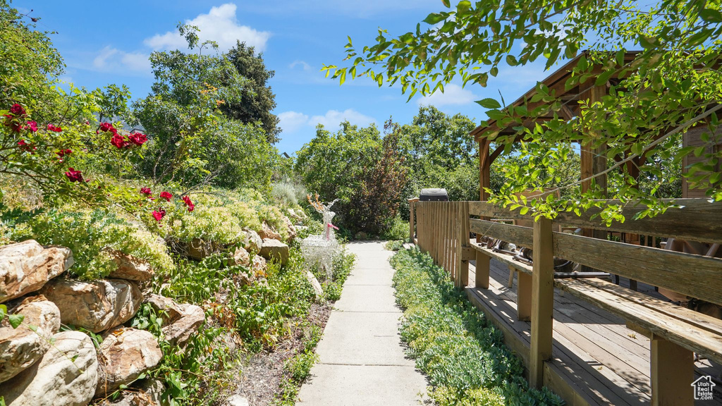View of yard with a deck