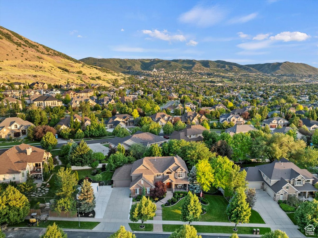 Aerial perspective of suburban area featuring mountains