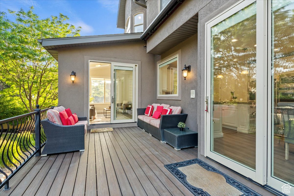 Deck with an outdoor living space