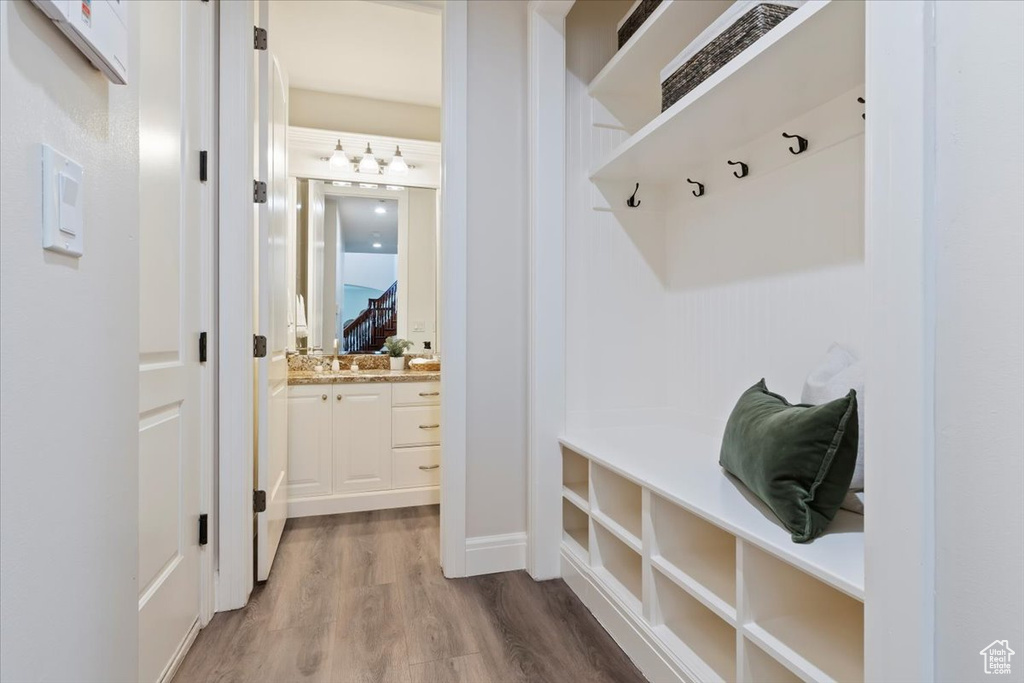 Mudroom featuring dark wood-style floors