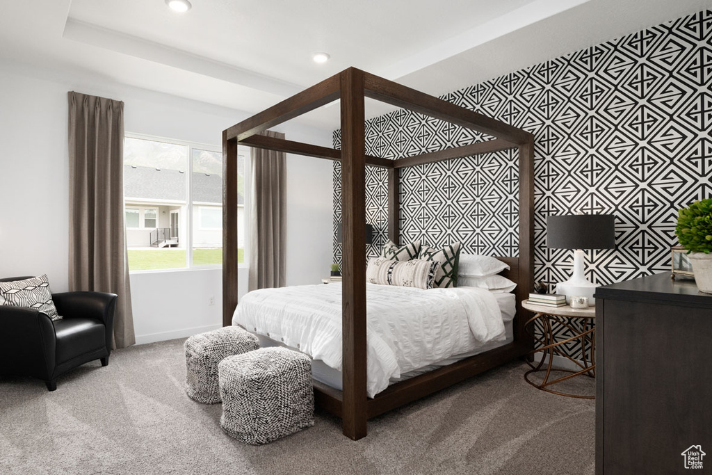 Carpeted bedroom with recessed lighting and baseboards