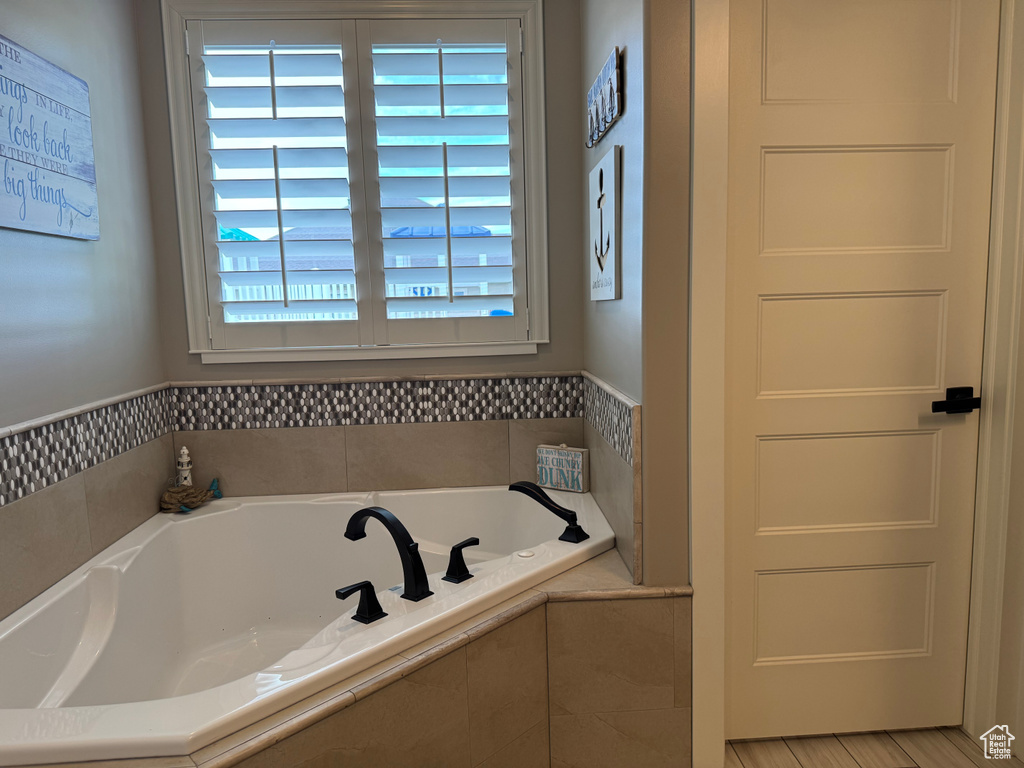 Full bath with a bath