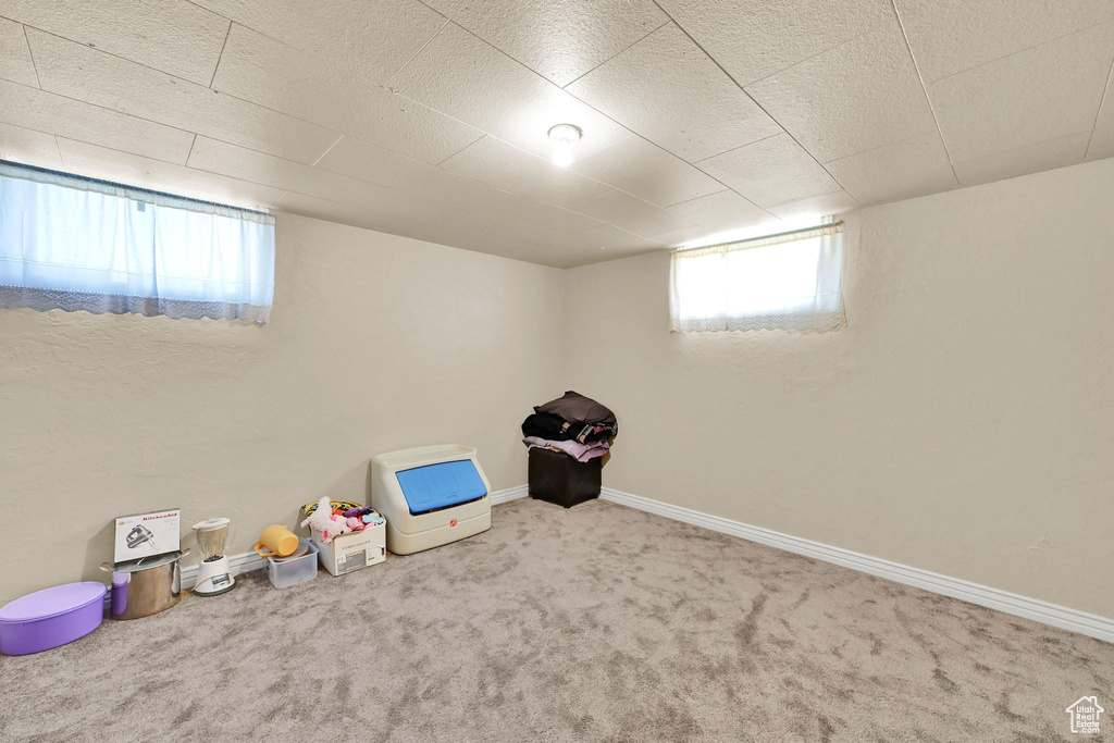 Game room featuring carpet flooring and baseboards