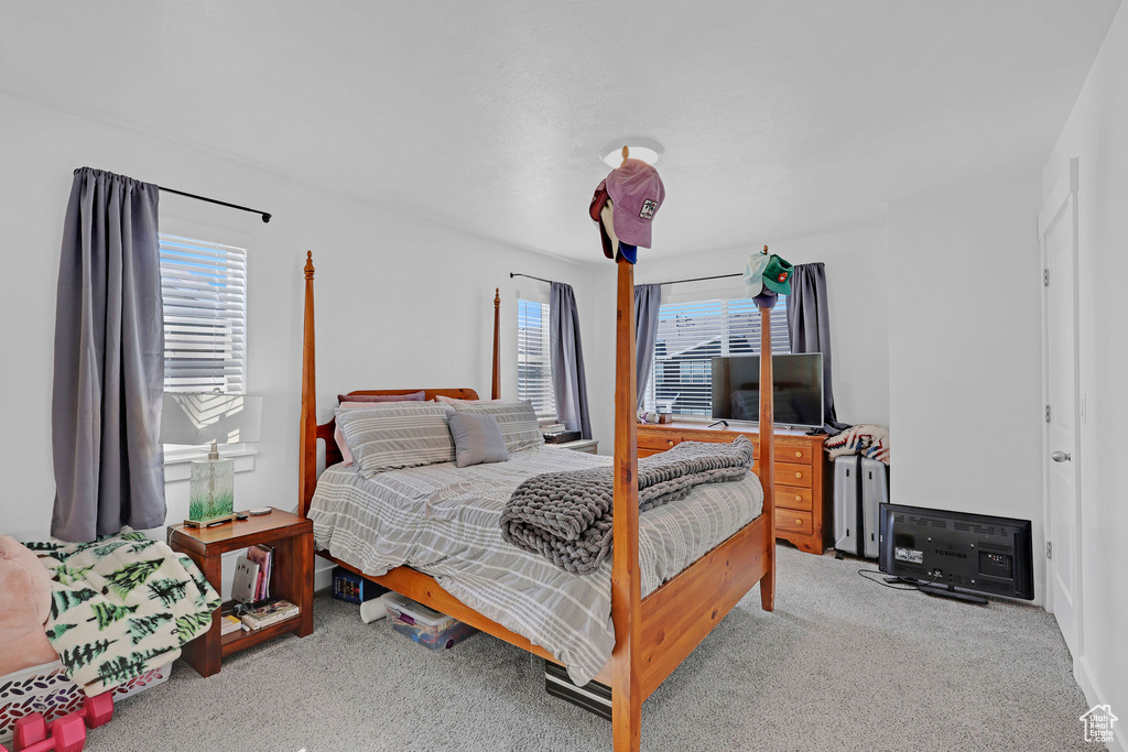 Bedroom featuring carpet
