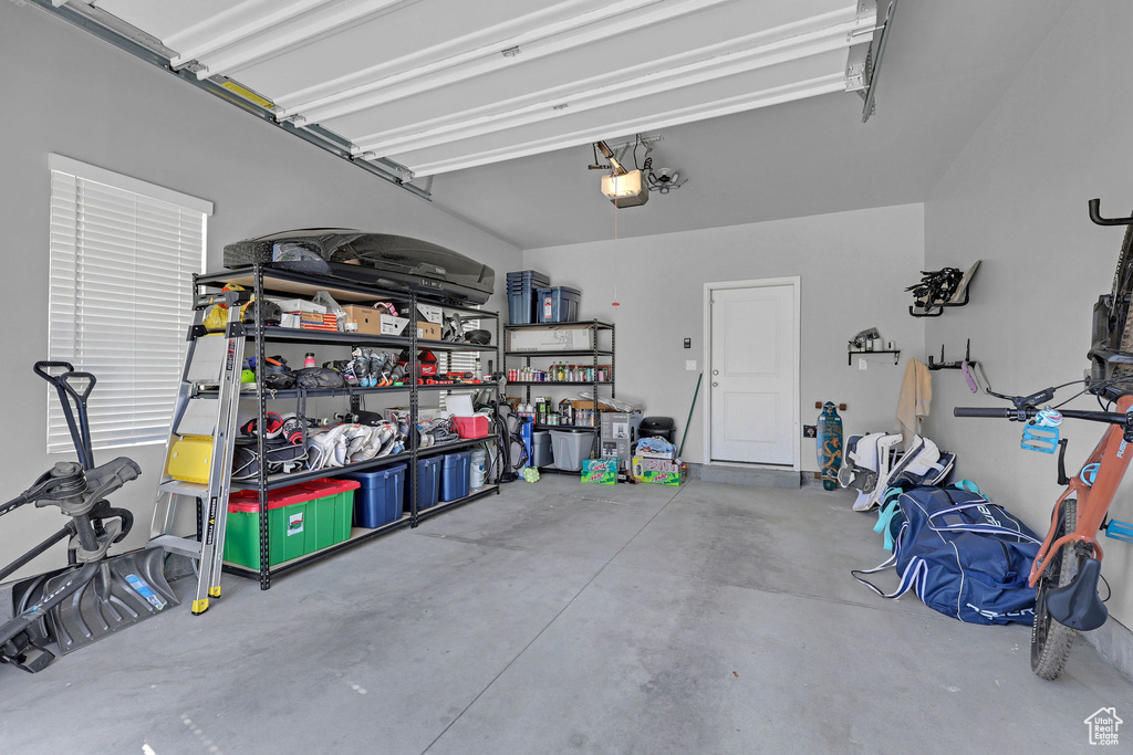 Garage featuring a garage door opener