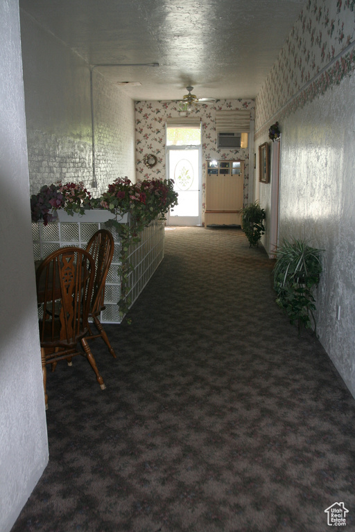 Corridor with carpet flooring