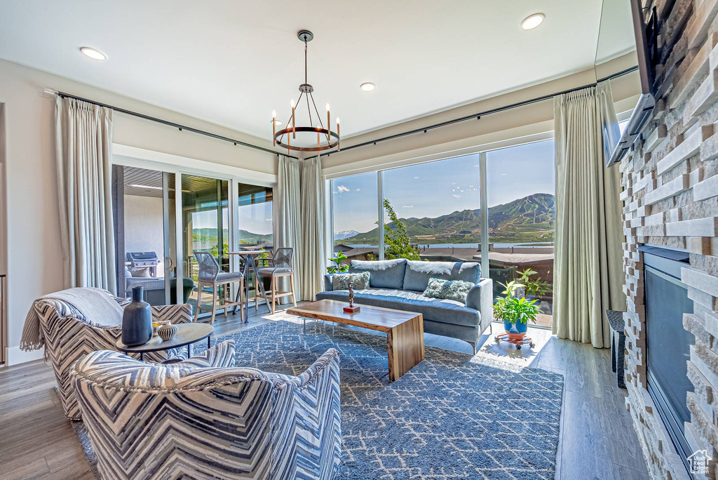 Sunroom featuring a chandelier