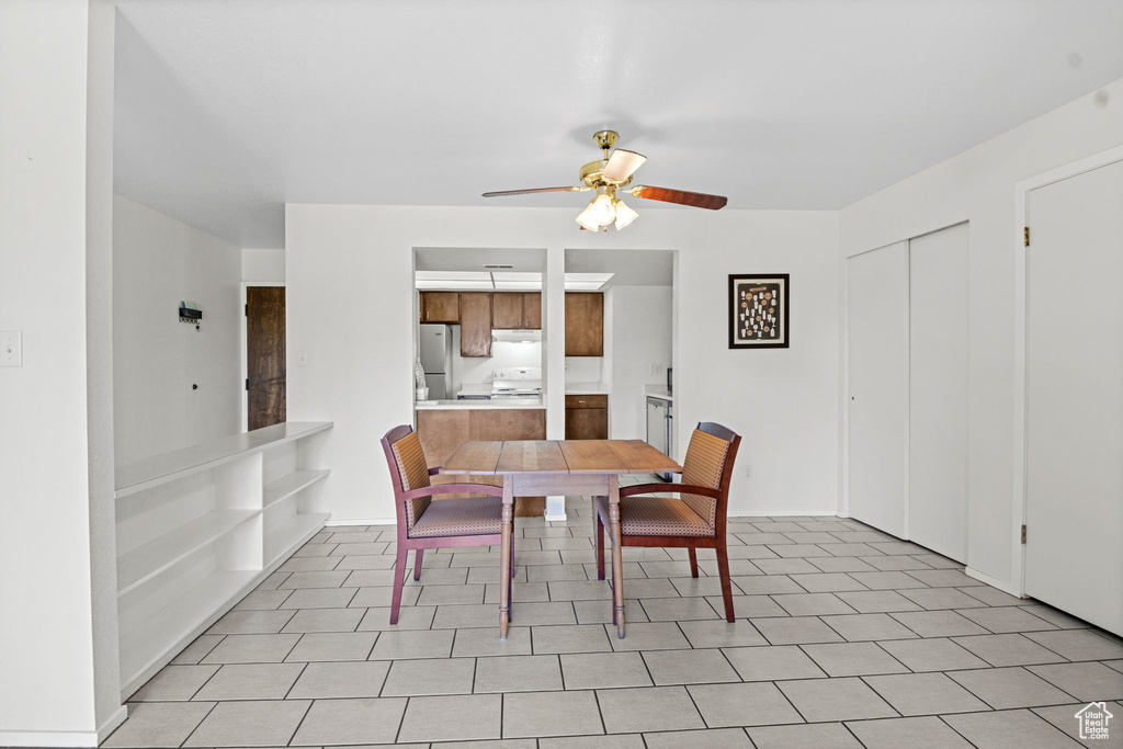 Dining space with ceiling fan