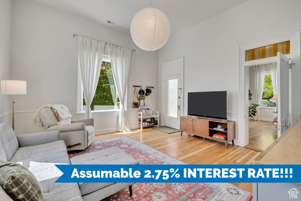 Living area with wood finished floors