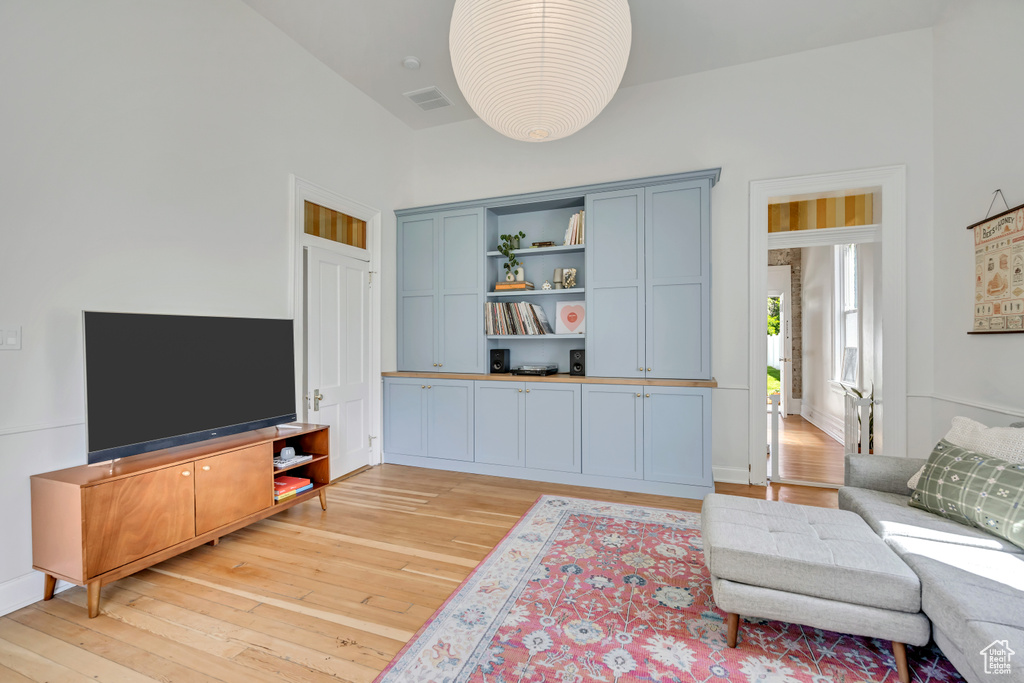 Living room with light wood-style floors