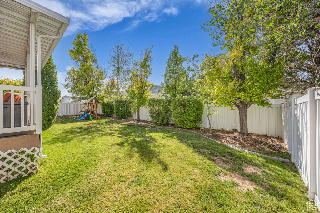 View of yard featuring a playground
