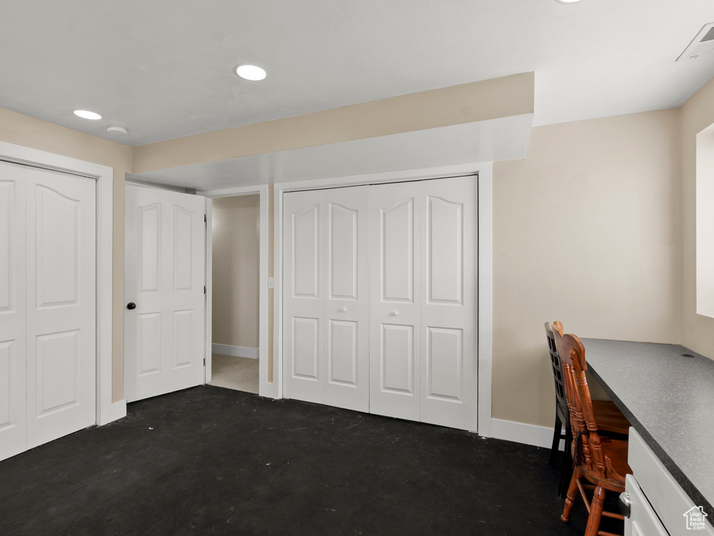 Unfurnished office featuring baseboards and recessed lighting
