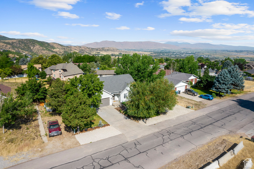 Aerial view of residential area with a mountain backdrop