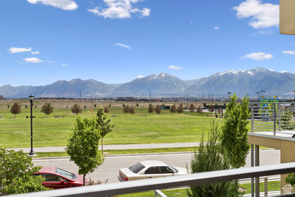 View of mountain backdrop featuring rural landscape and agricultural land