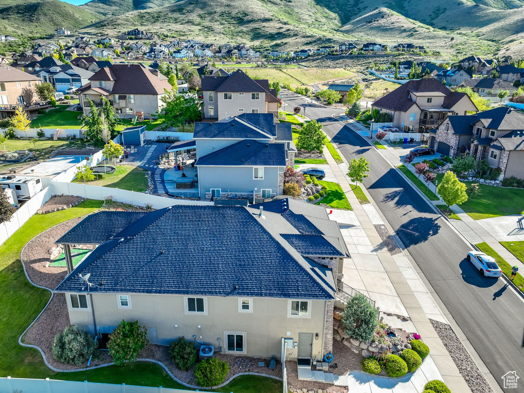 Aerial perspective of suburban area featuring mountains