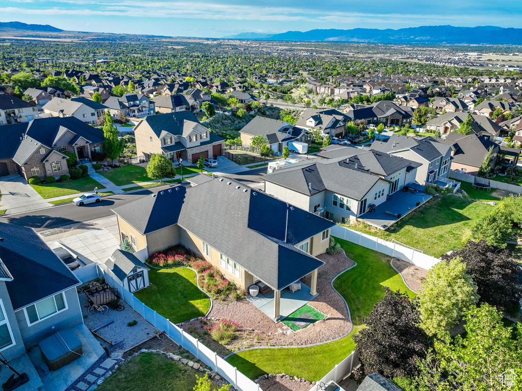 Aerial view of residential area with a mountain backdrop