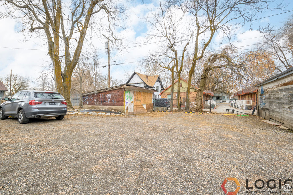 View of side of property featuring brick siding