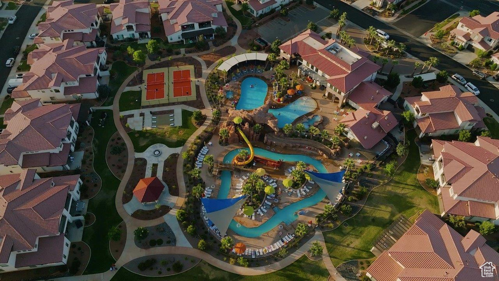 Aerial view of property's location with nearby suburban area