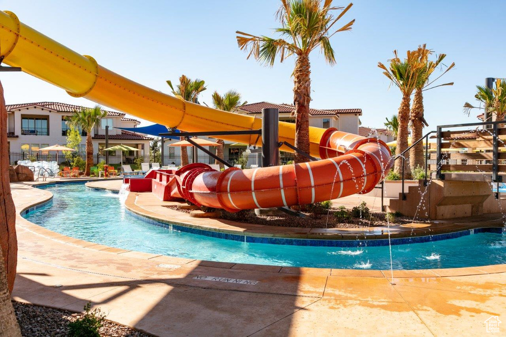 Community pool with a water slide