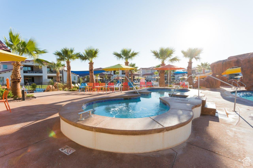 Community pool featuring a patio area