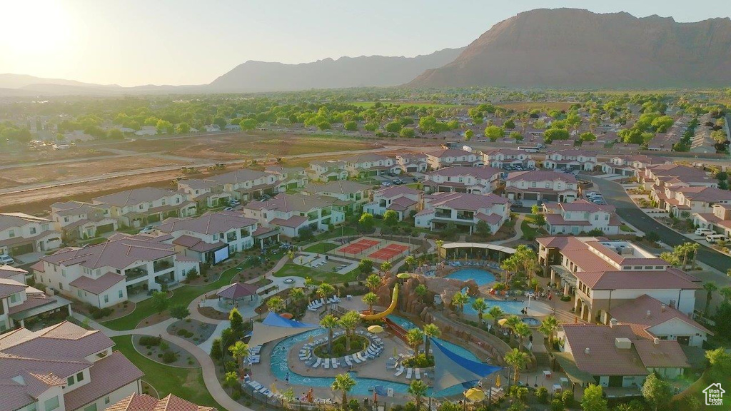 View of property location featuring a mountainous background and nearby suburban area