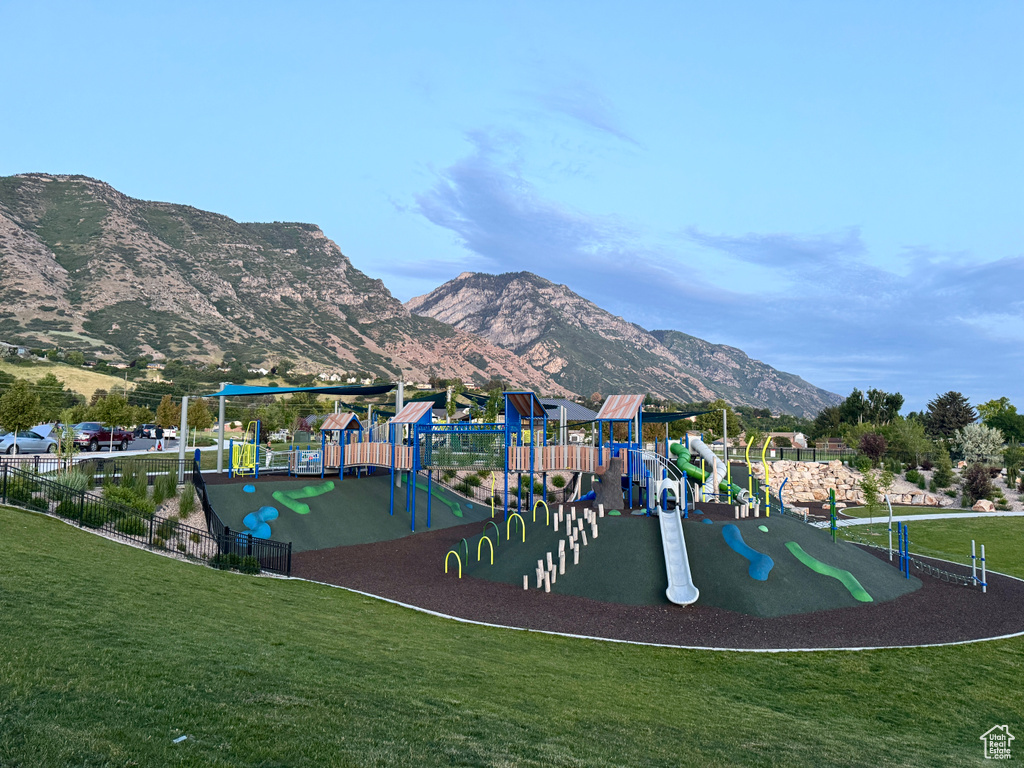 Community jungle gym with a mountain view