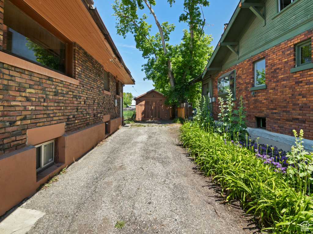 View of home\'s exterior featuring brick siding