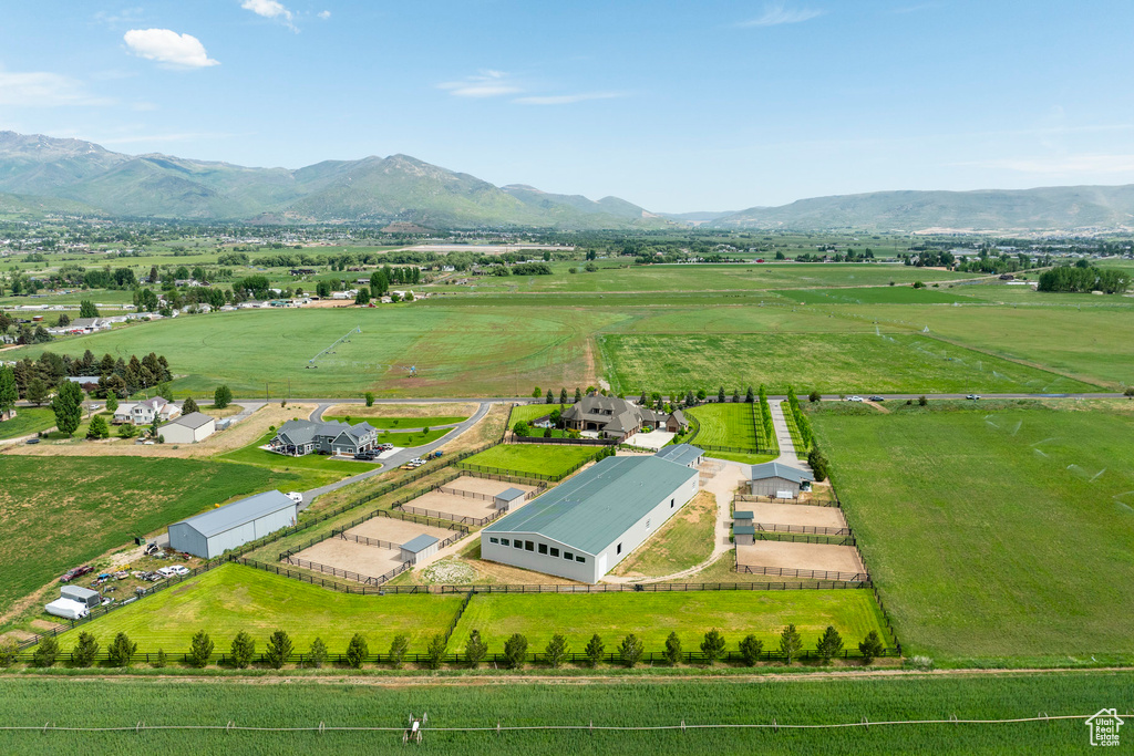 Aerial view of sparsely populated area with a mountainous background