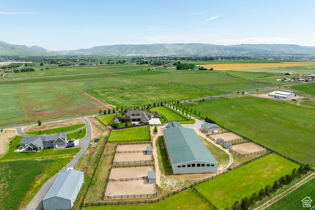 Aerial view of sparsely populated area with a mountainous background