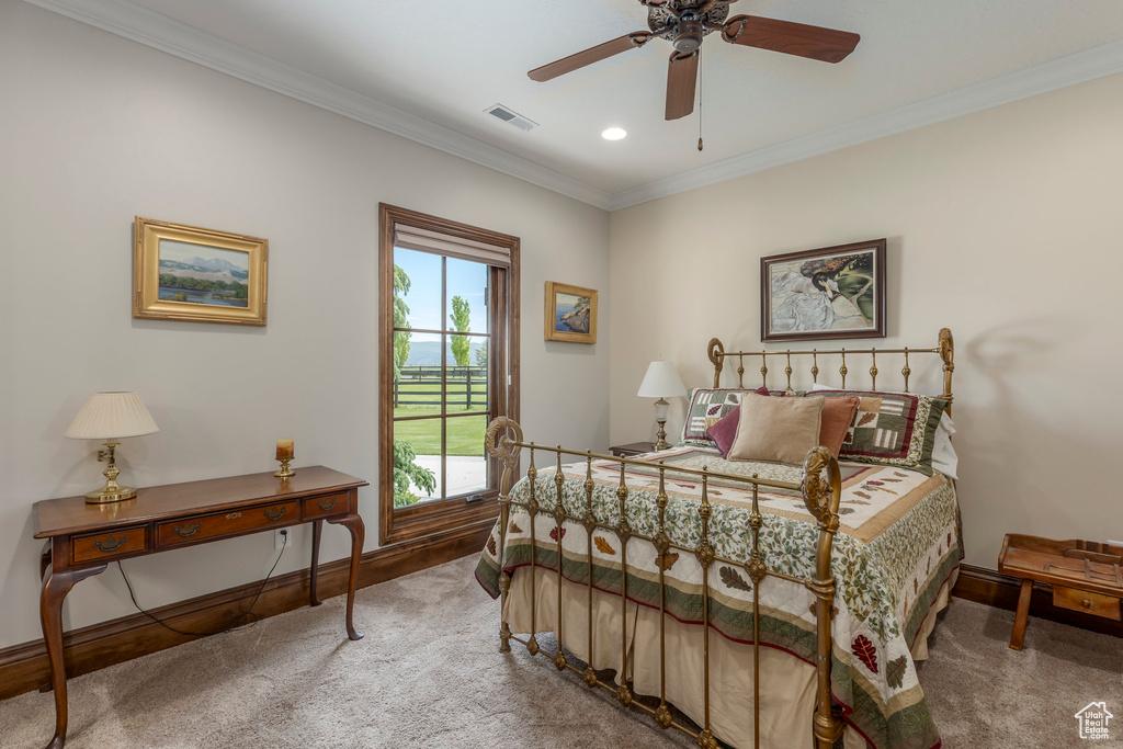 Carpeted bedroom with ornamental molding, baseboards, recessed lighting, and a ceiling fan