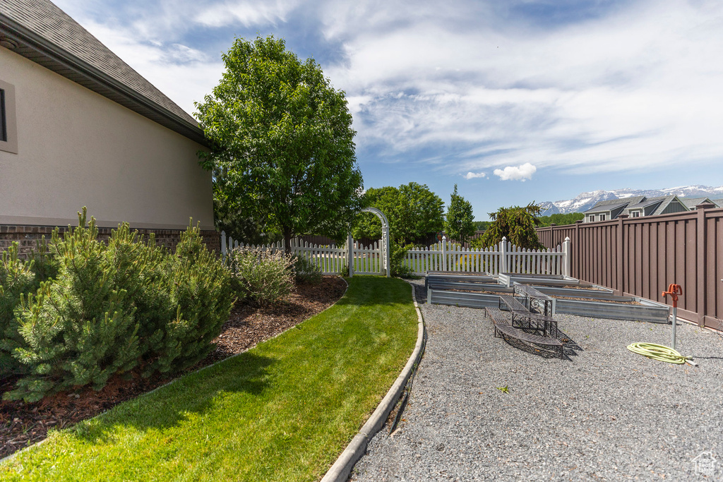 View of yard featuring a vegetable garden