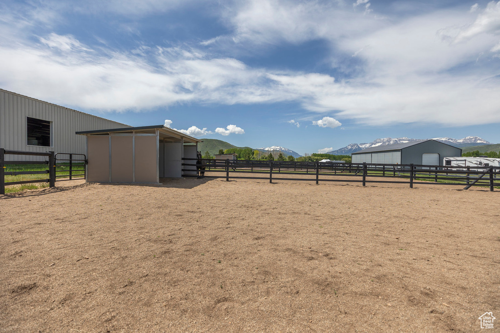 Stable featuring a mountain view