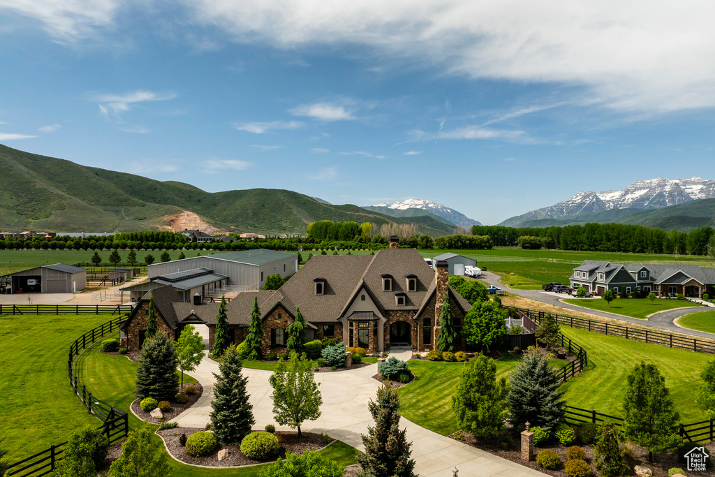 View of mountain backdrop featuring rural landscape