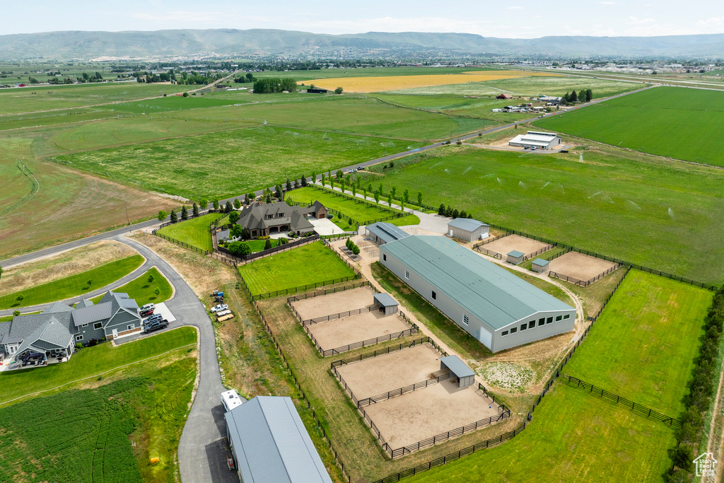 Overview of rural landscape with a mountainous background and abundant farmland