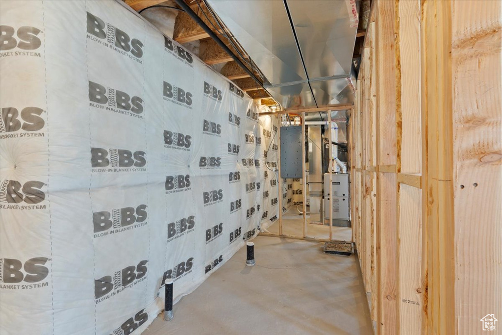 Bathroom featuring concrete flooring and heating unit