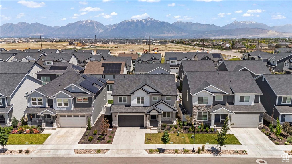 Aerial view of residential area with mountains