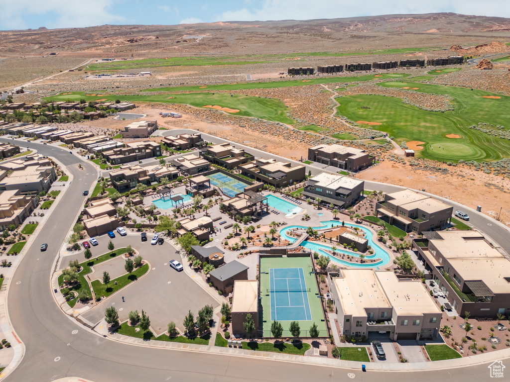 Aerial view of a pool and a golf course