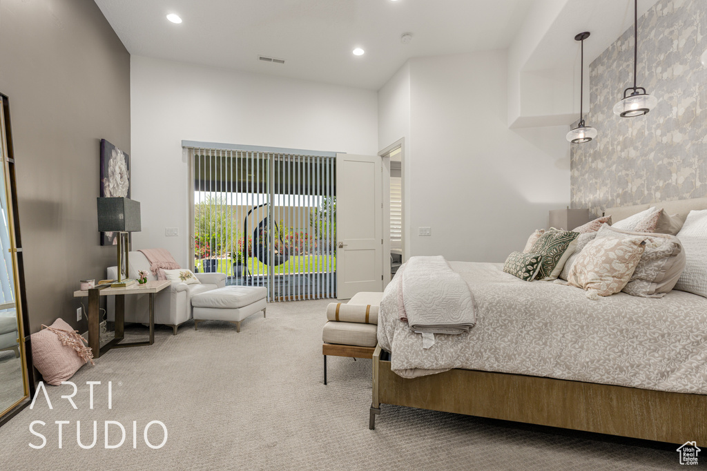 Carpeted bedroom featuring access to outside and recessed lighting