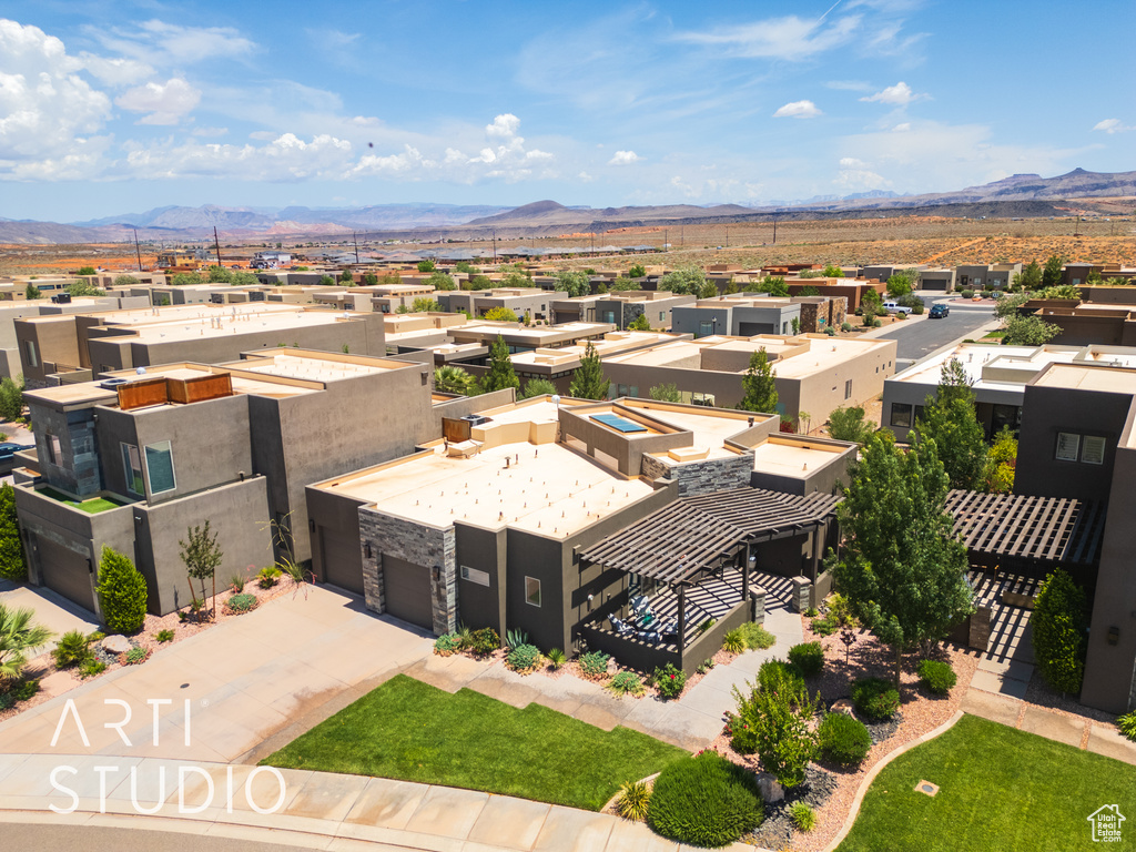 Aerial view of residential area with a mountain backdrop