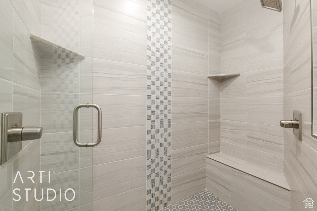 Bathroom featuring a shower stall
