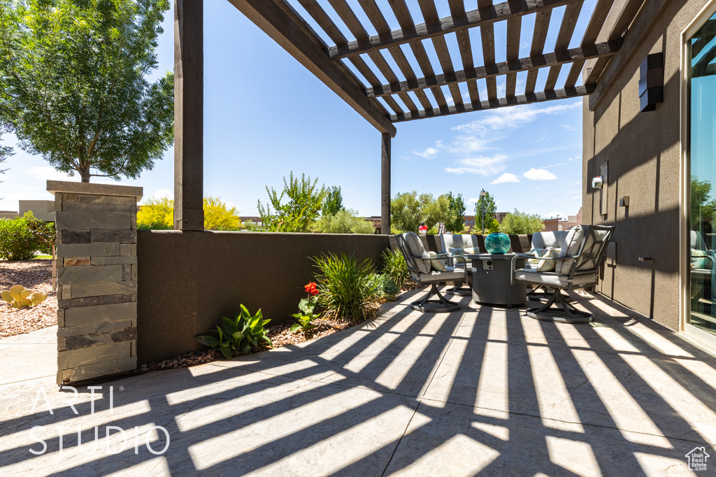 View of patio / terrace with outdoor dining space and a pergola