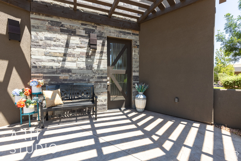 View of patio with a pergola