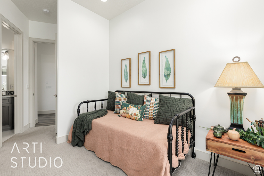 Bedroom with carpet and baseboards