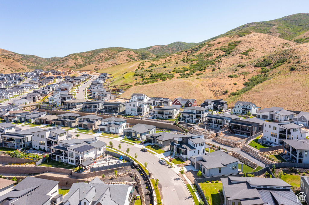 Aerial view of residential area with a mountain backdrop