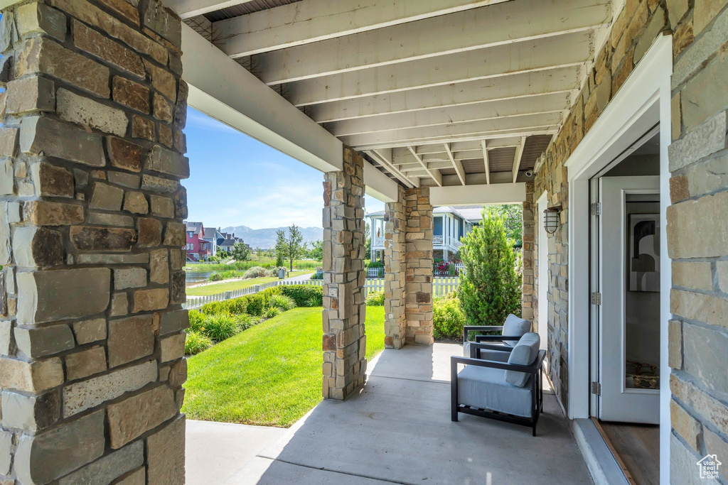 Porch featuring a mountain view
