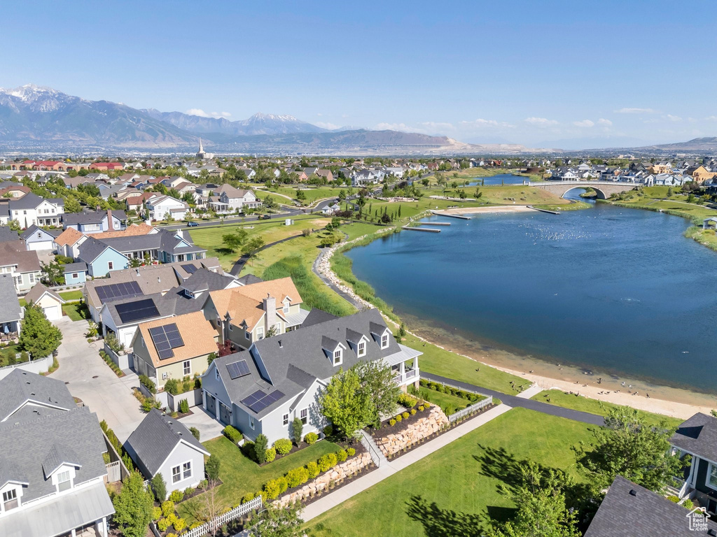 Aerial view of residential area featuring a water and mountain view