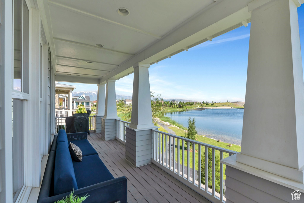 Deck featuring a water view