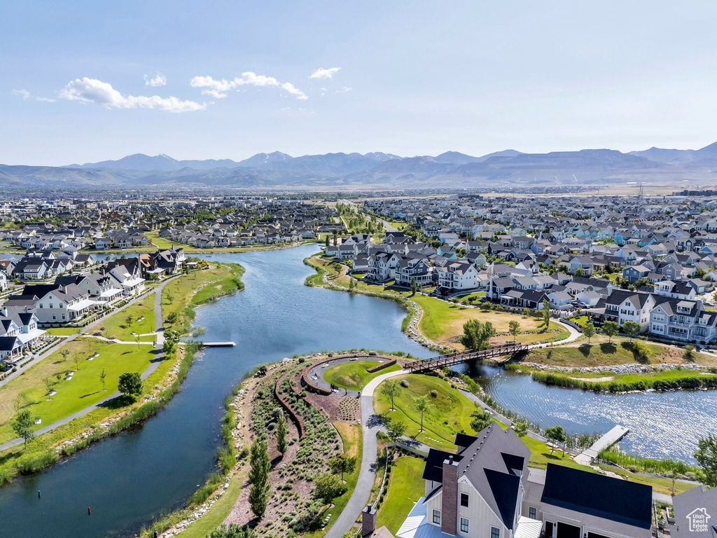 Aerial view of residential area with a water and mountain view