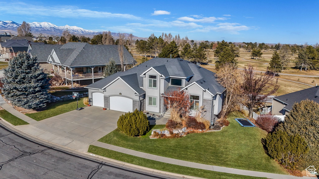 View from above of property featuring a mountainous background